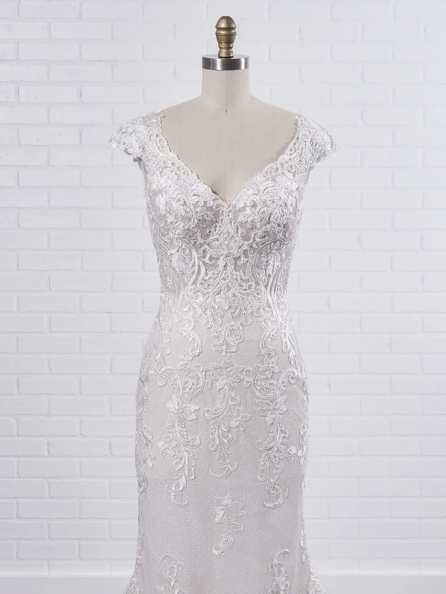 Maggie Sottero Celeste Delicate chic sheath wedding dress designed to flatter from all angles 9MS901 Color1