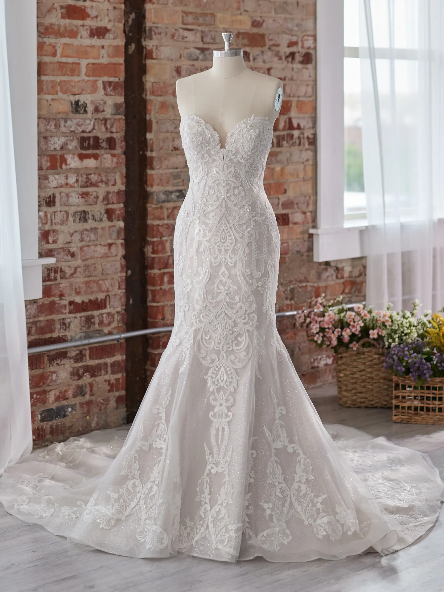 Maggie Sottero Frederique elegant embroidered dress in rustic setting