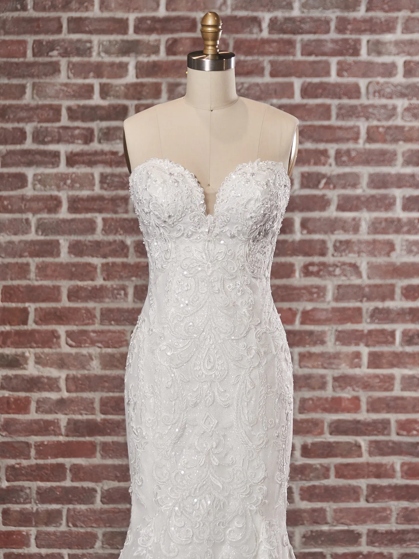 Maggie Sottero Frederique elegant lace bridal gown front view.