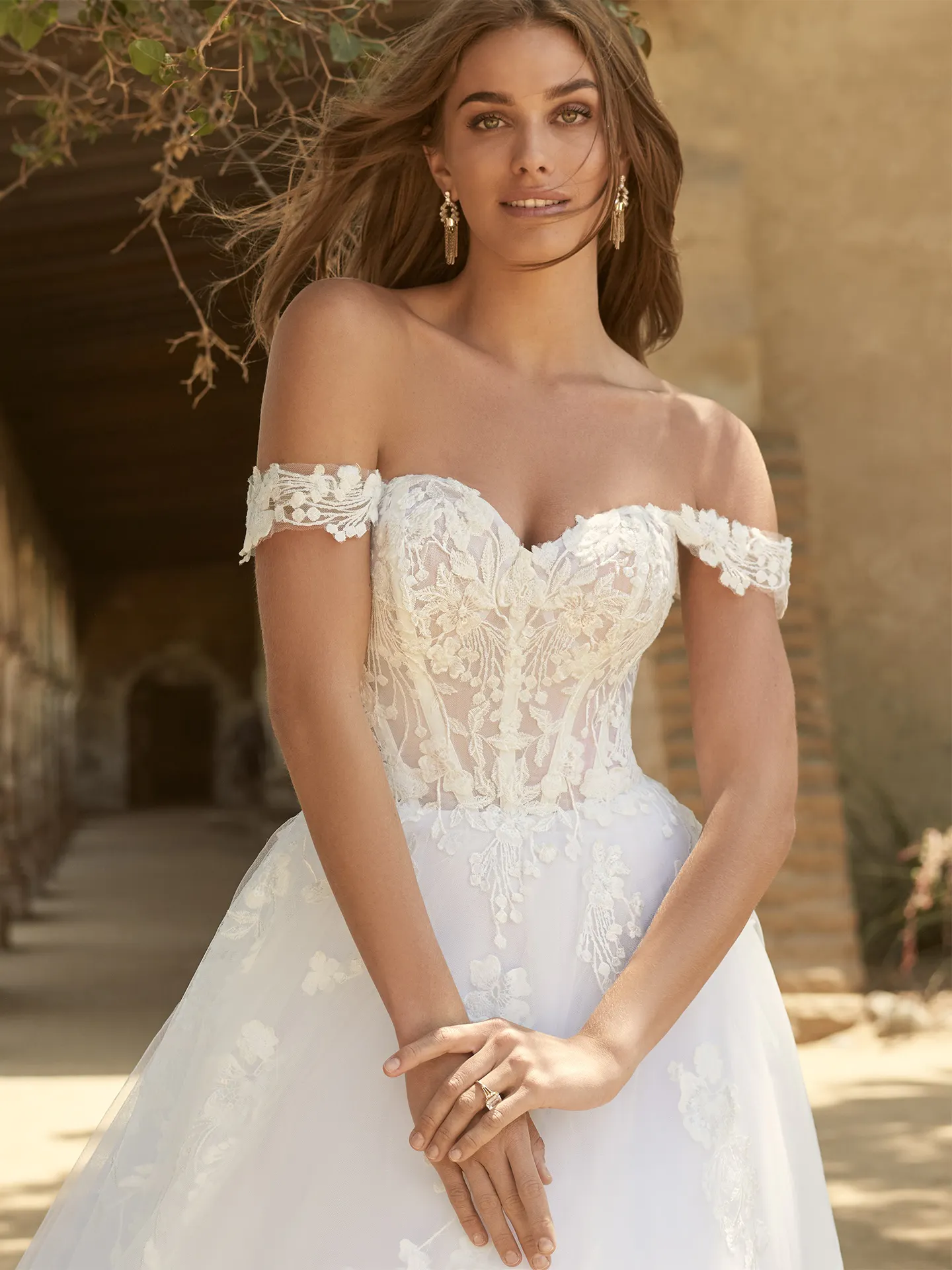 Maggie Sottero Harlem front view lace off-shoulder fairytale wedding gown