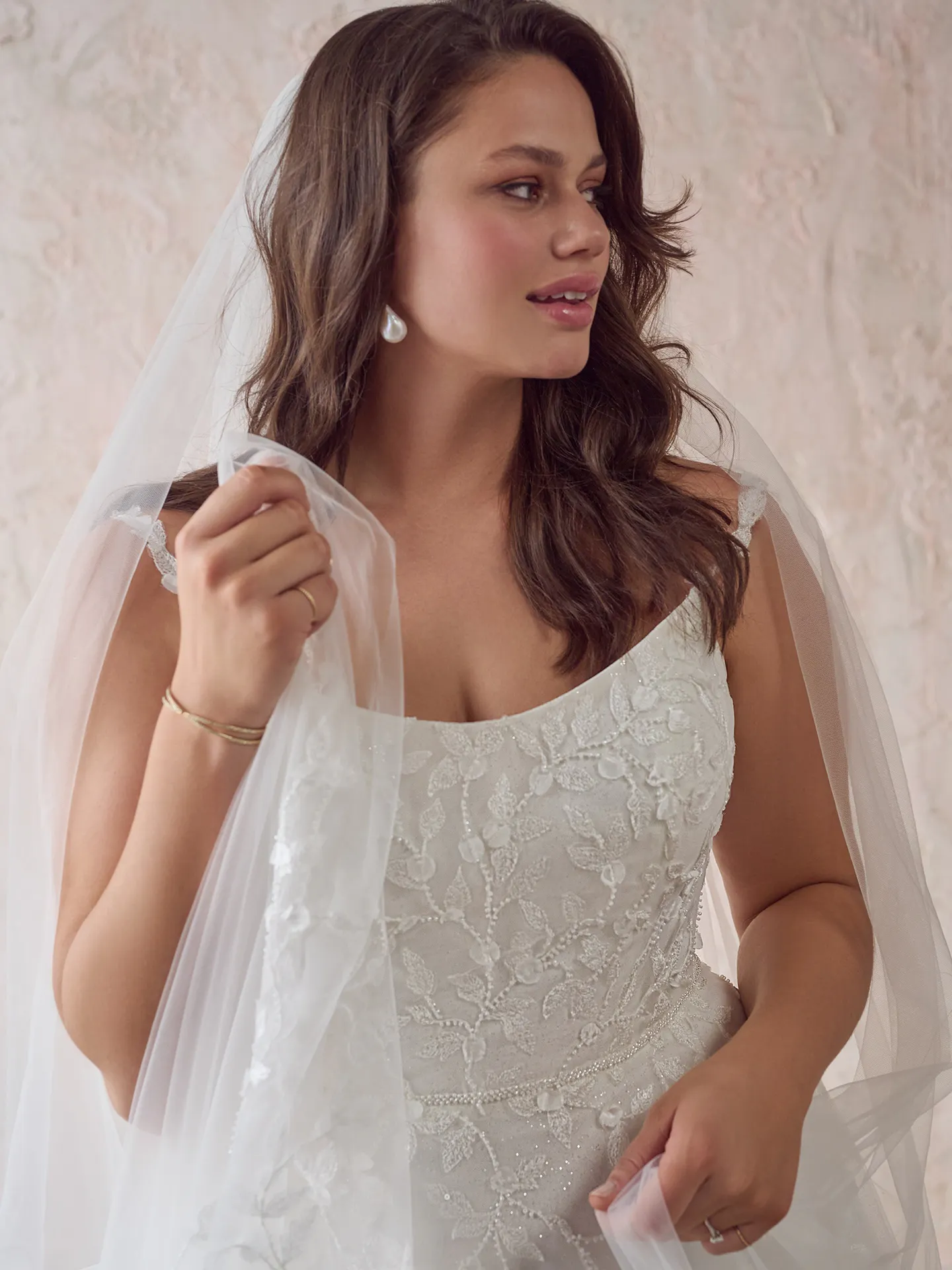 Maggie Sottero wedding dress with lace detail front view