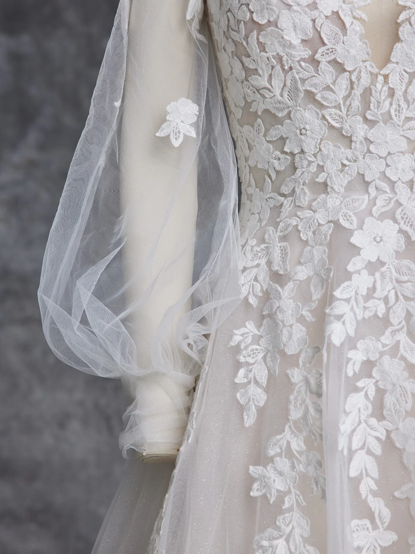Maggie Sottero Alexandria lace detail bishop sleeve wedding dress.