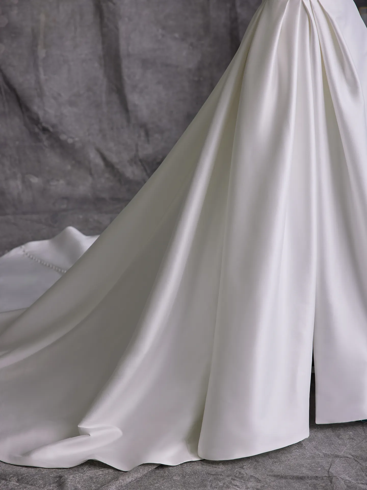Sottero and Midgley Aspen back view of A-line strapless wedding dress showing train
