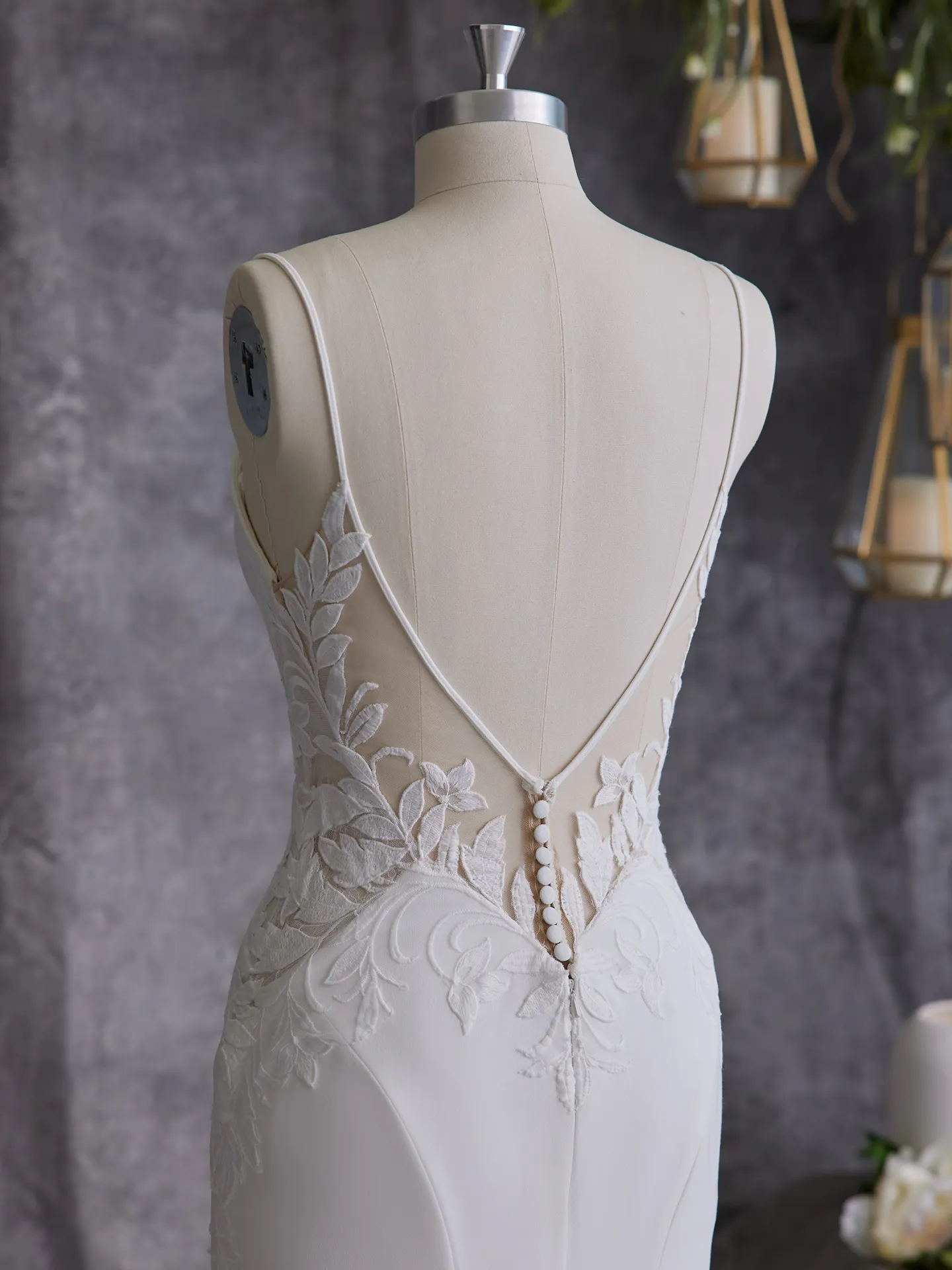 Rebecca Ingram Dionne back view with lace detail on mannequin