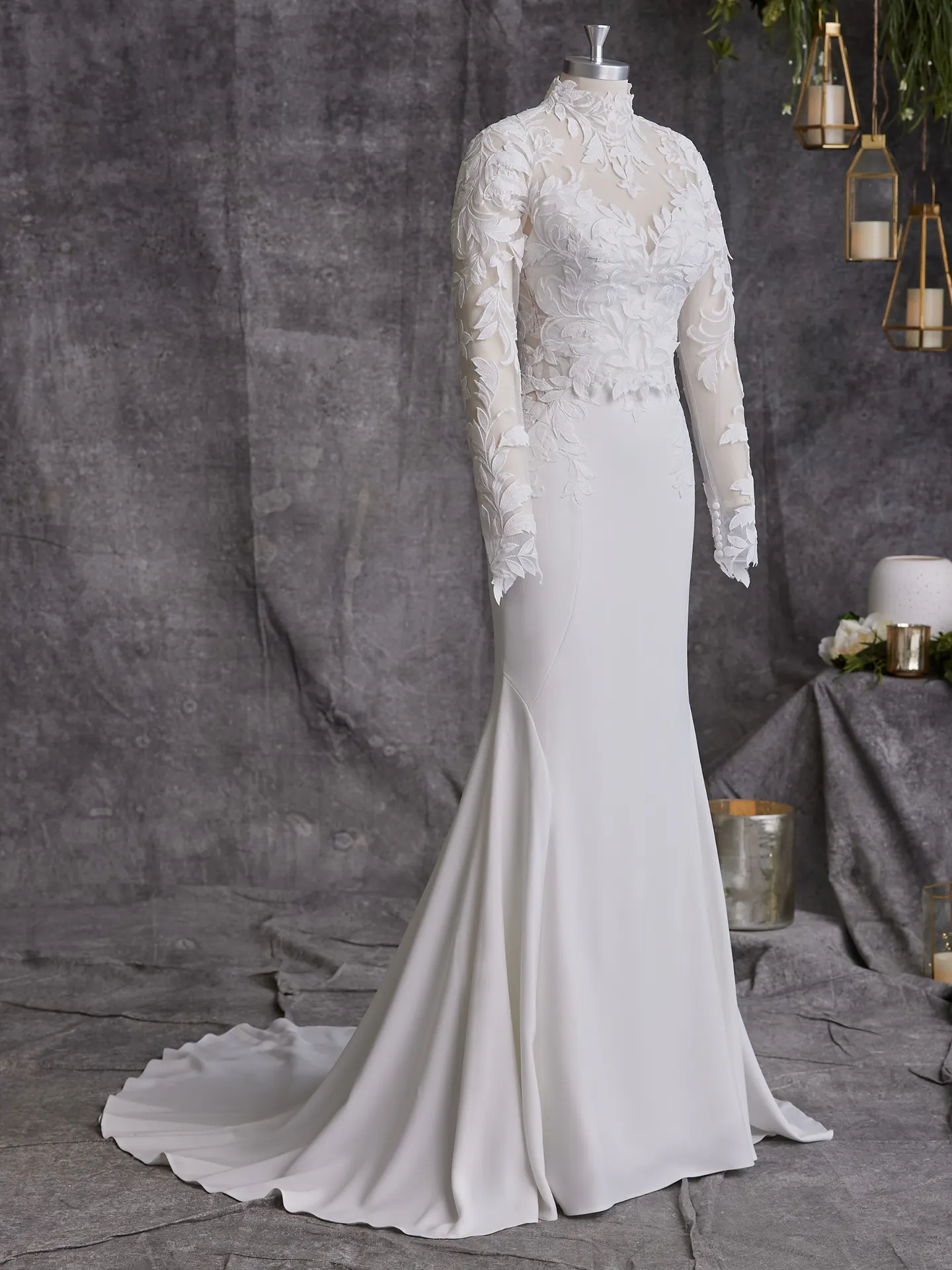 Rebecca Ingram Dionne front view lace-crepe sheath wedding dress on mannequin