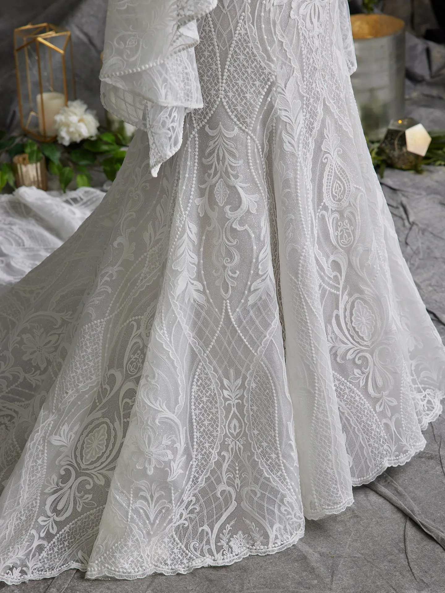Sottero and Midgley Bronson lace detail fit-and-flare wedding dress fabric close-up.