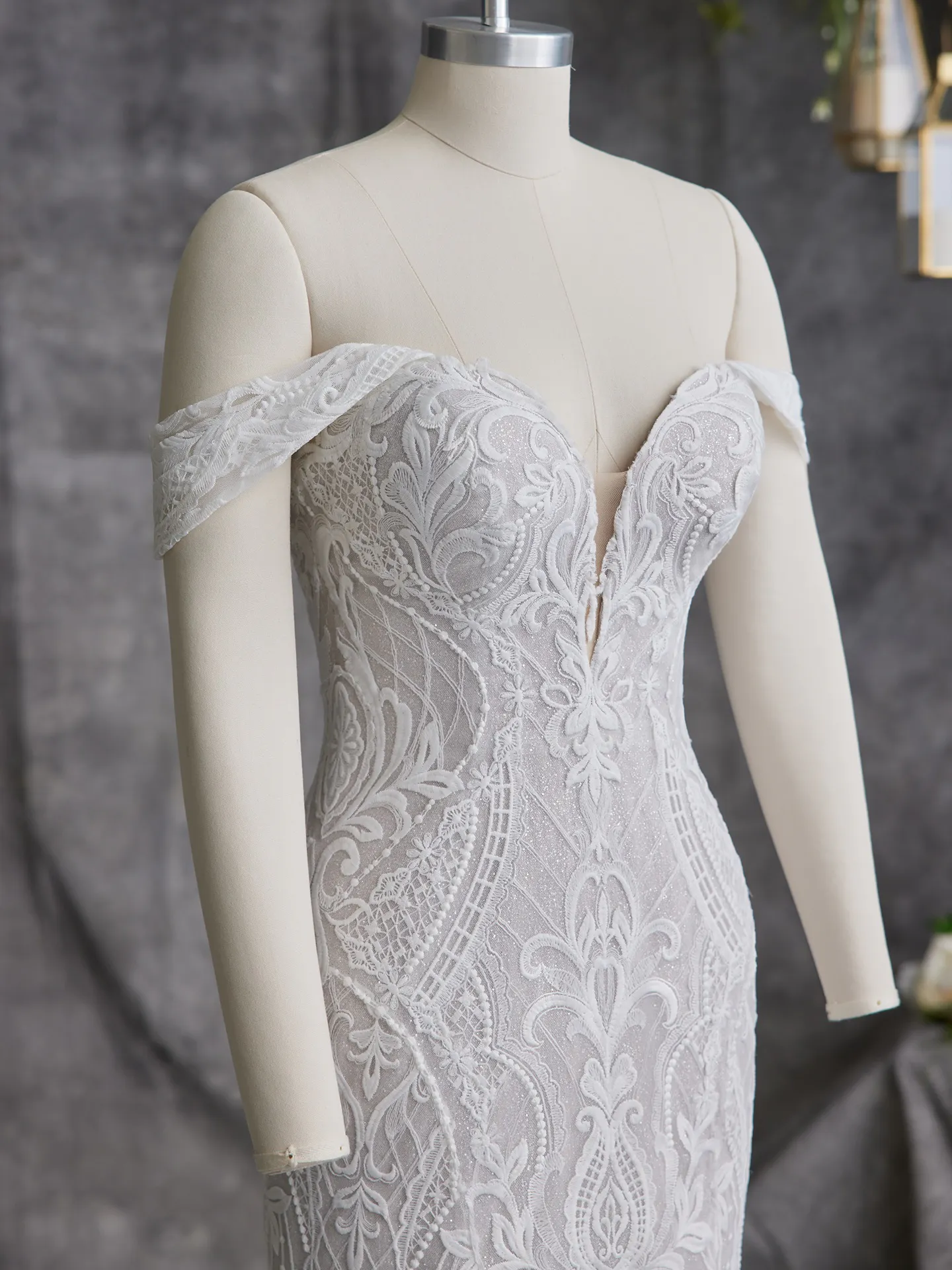 Sottero and Midgley Bronson lace fit-and-flare gown on mannequin front view