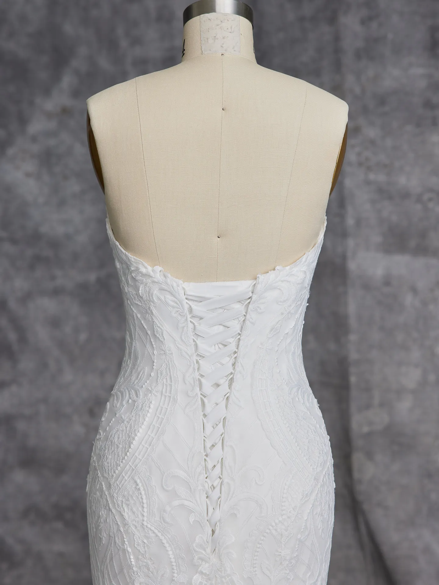 Sottero and Midgley Bronson back view lace-up boho fit-and-flare bridal gown.