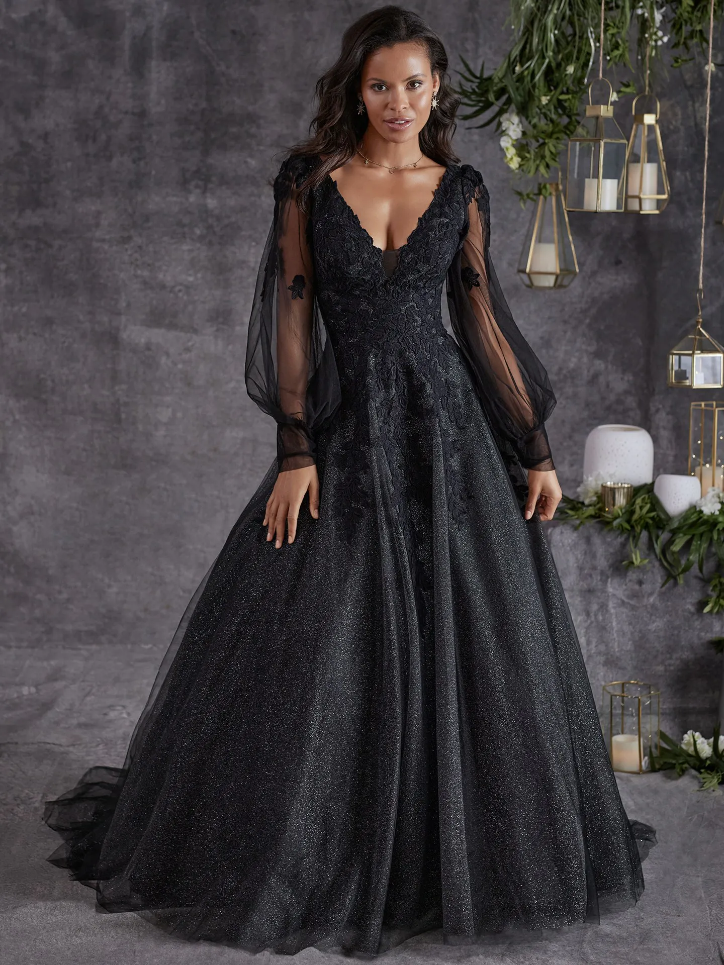 Maggie Sottero Alexandria black gown front view with bishop sleeves