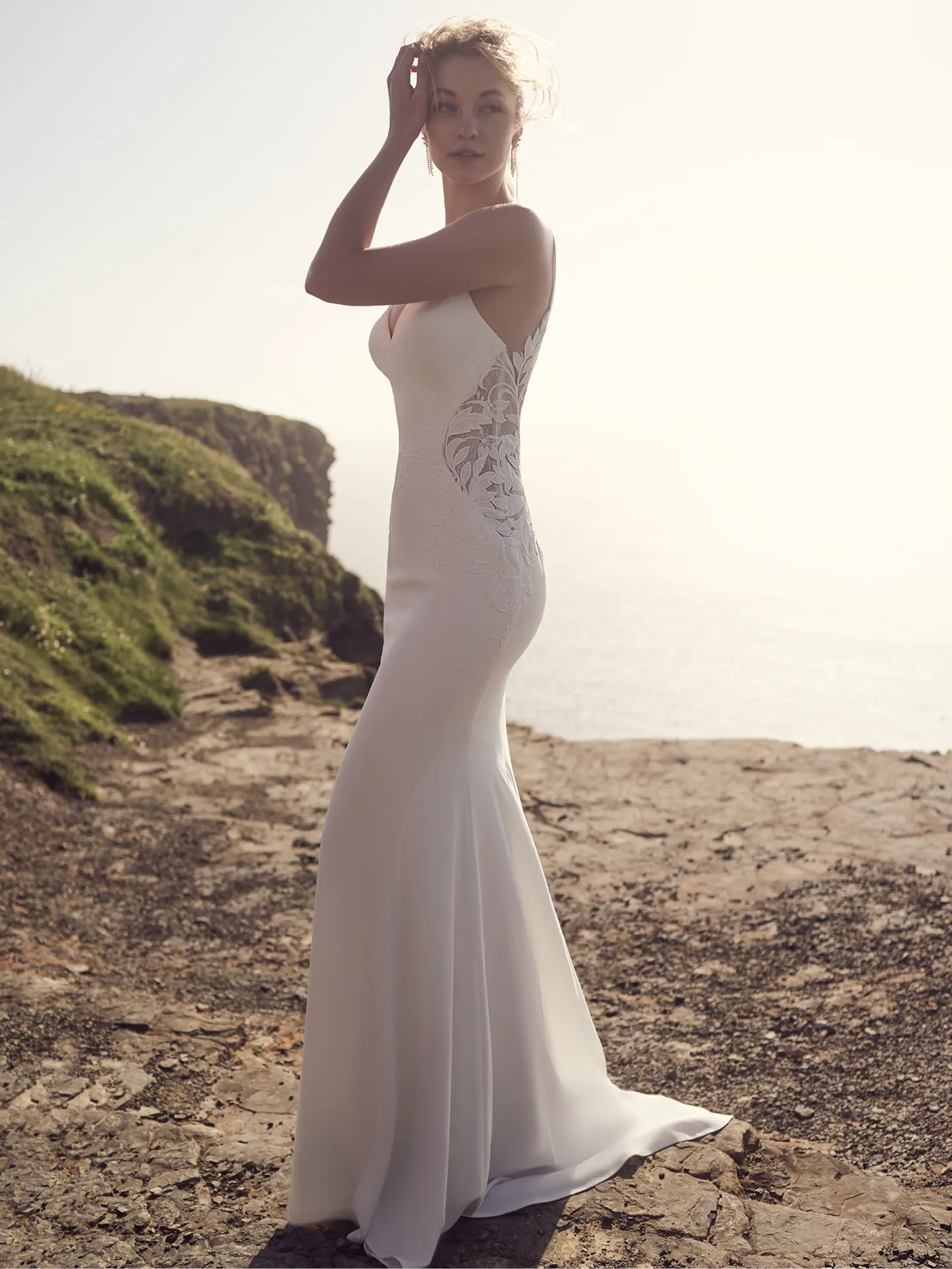 Rebecca Ingram Dionne Regal V-neck crepe dress side view outdoors