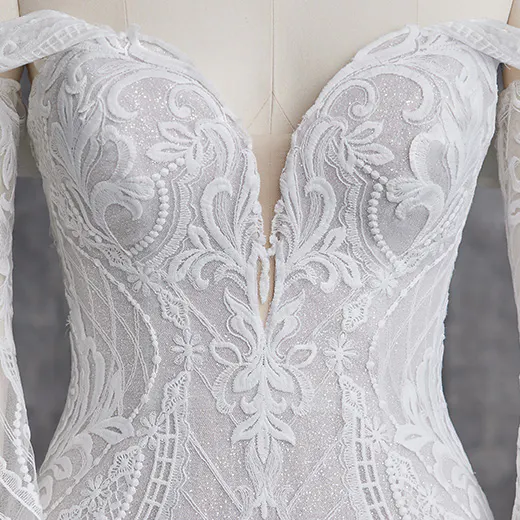 Sottero and Midgley Bronson bodice detail with intricate lace pattern, fit-and-flare style.