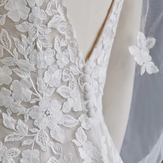 Maggie Sottero Alexandria detail floral lace and buttons close-up
