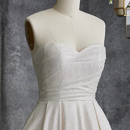 Anniston shimmery ballgown front view on dress form Maggie Sottero