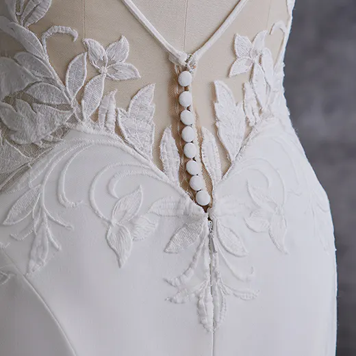 Rebecca Ingram Dionne back view with floral lace detail.