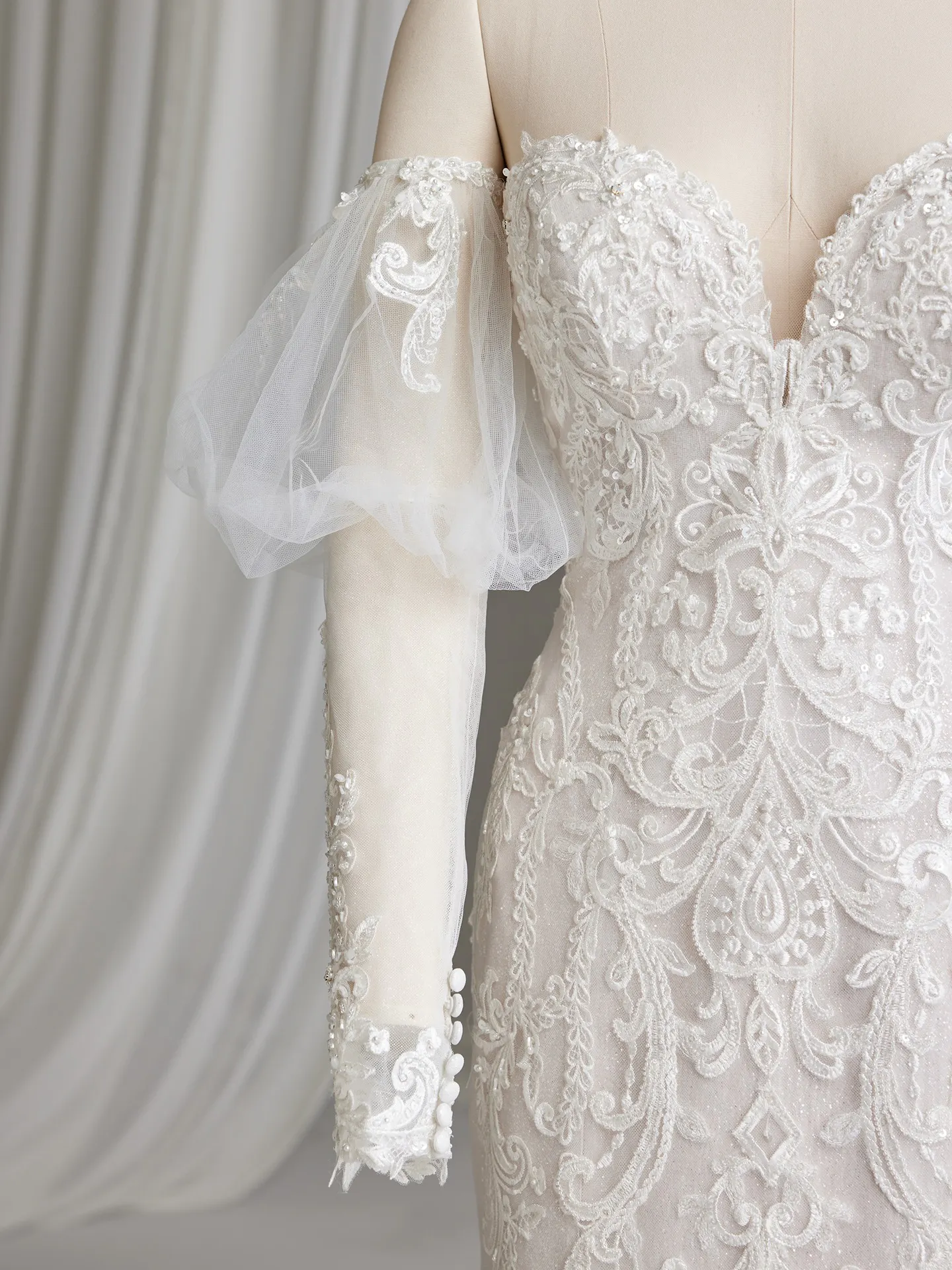 Maggie Sottero Frederique lace wedding dress with detachable sleeves front view.