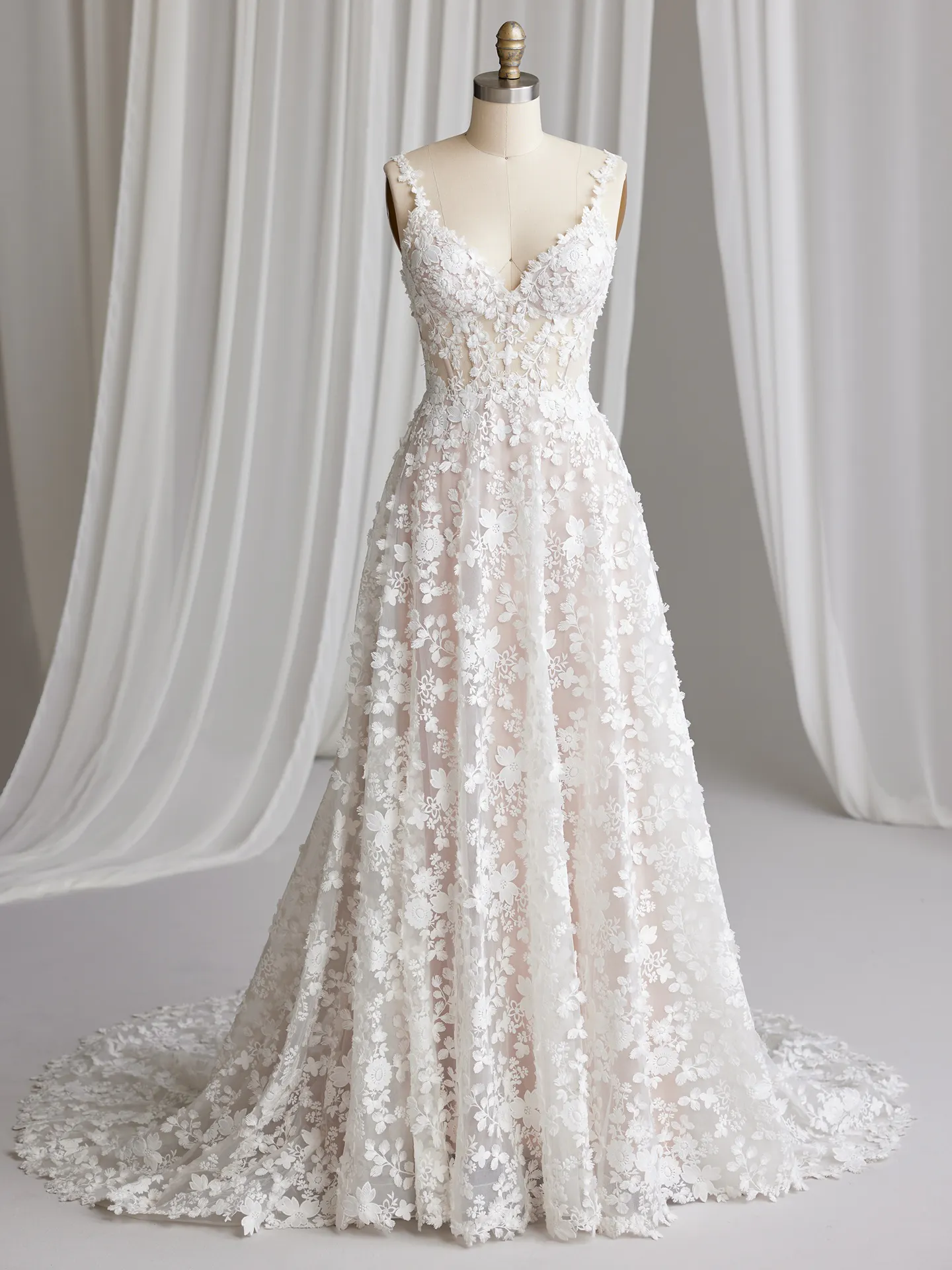 Maggie Sottero Ladonna front view, 3D floral wedding dress with flowy skirt and v-neck.