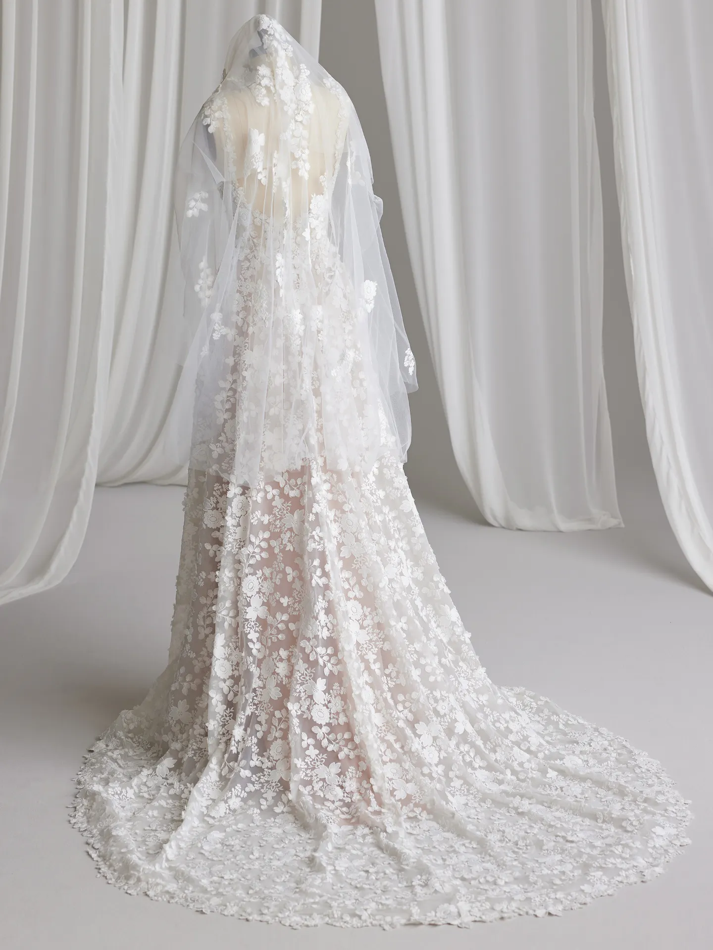 Ladonna back view, 3D floral lace wedding dress by Maggie Sottero with veil.