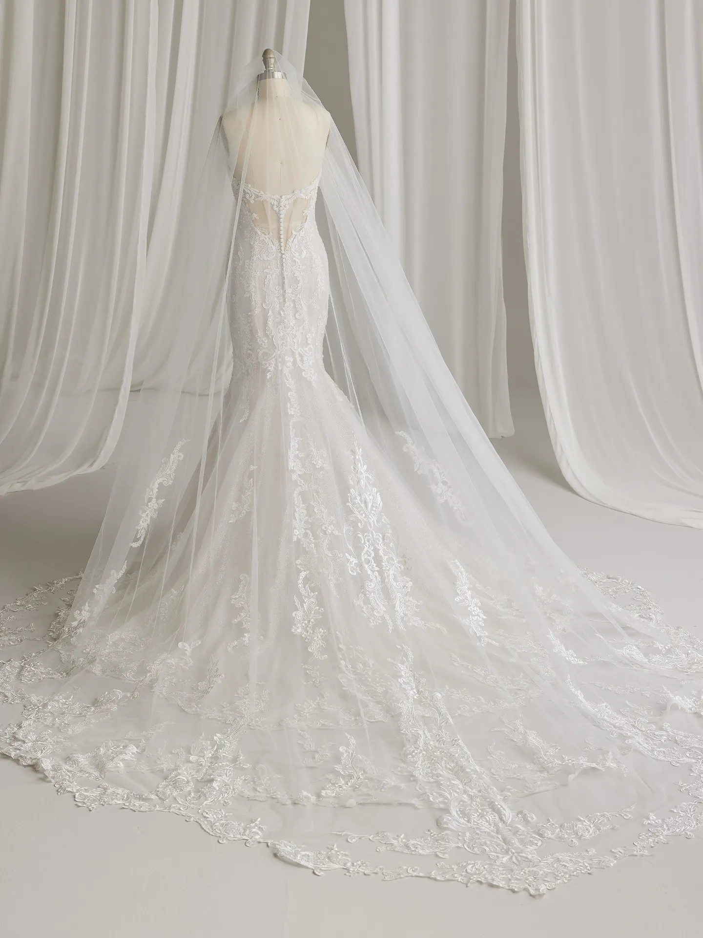 Maggie Sottero Frederique veil back view with lace details and cathedral length.
