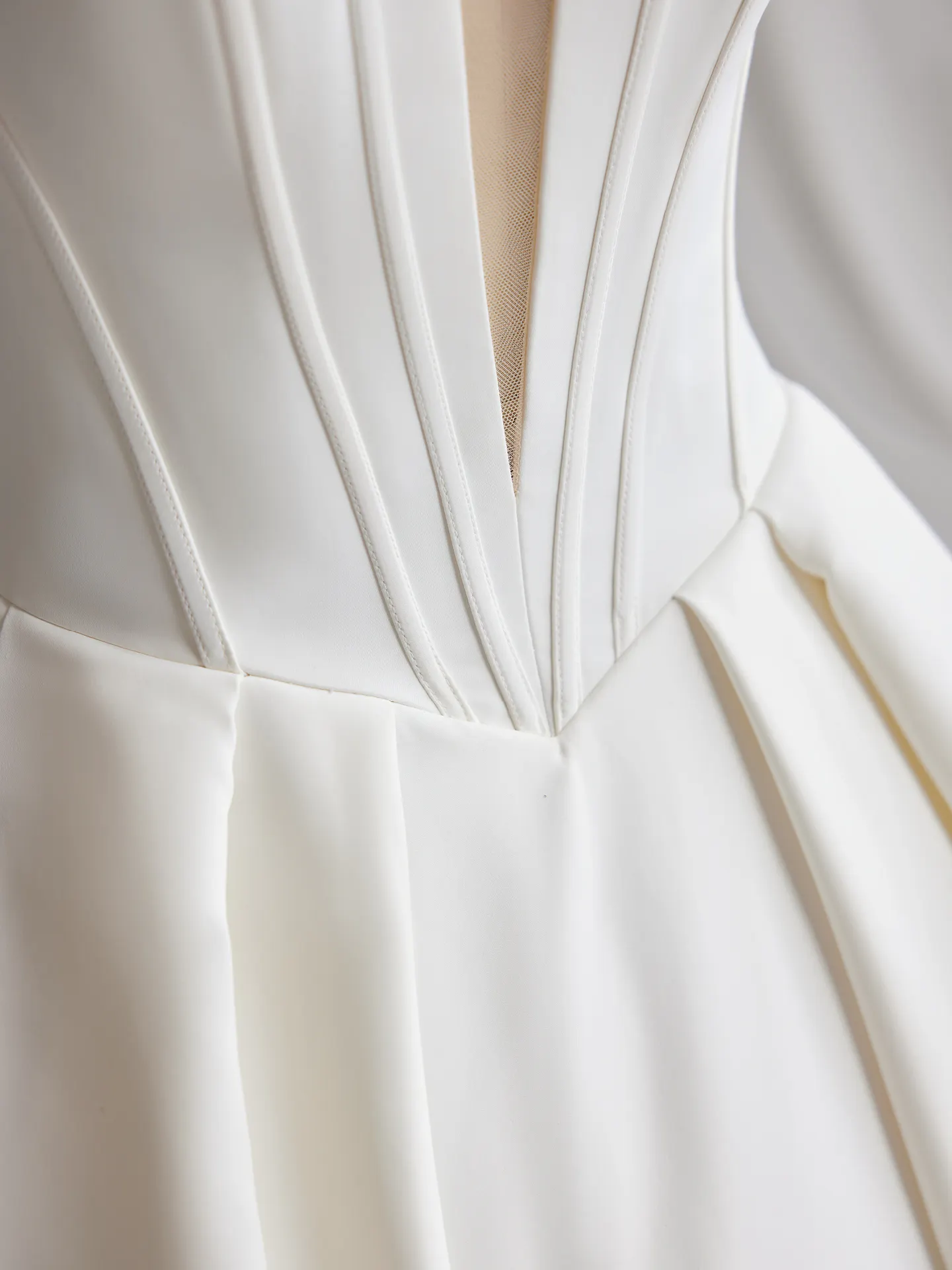 Maggie Sottero Derrick satin V-neck bridal gown detail