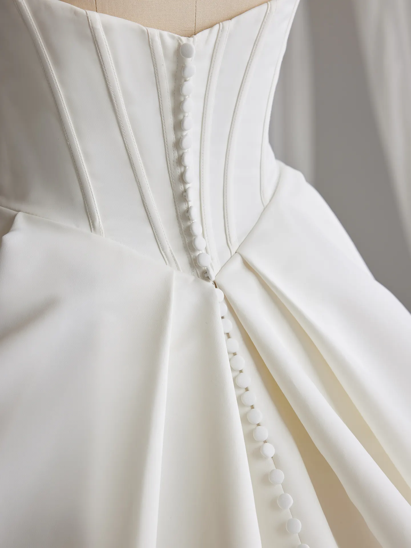 Maggie Sottero Derrick satin gown back button detail