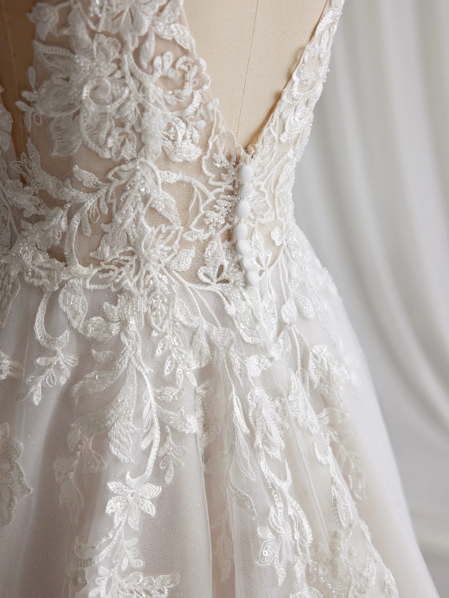 Rebecca Ingram Lizzy back view lace detail A-Line gown.