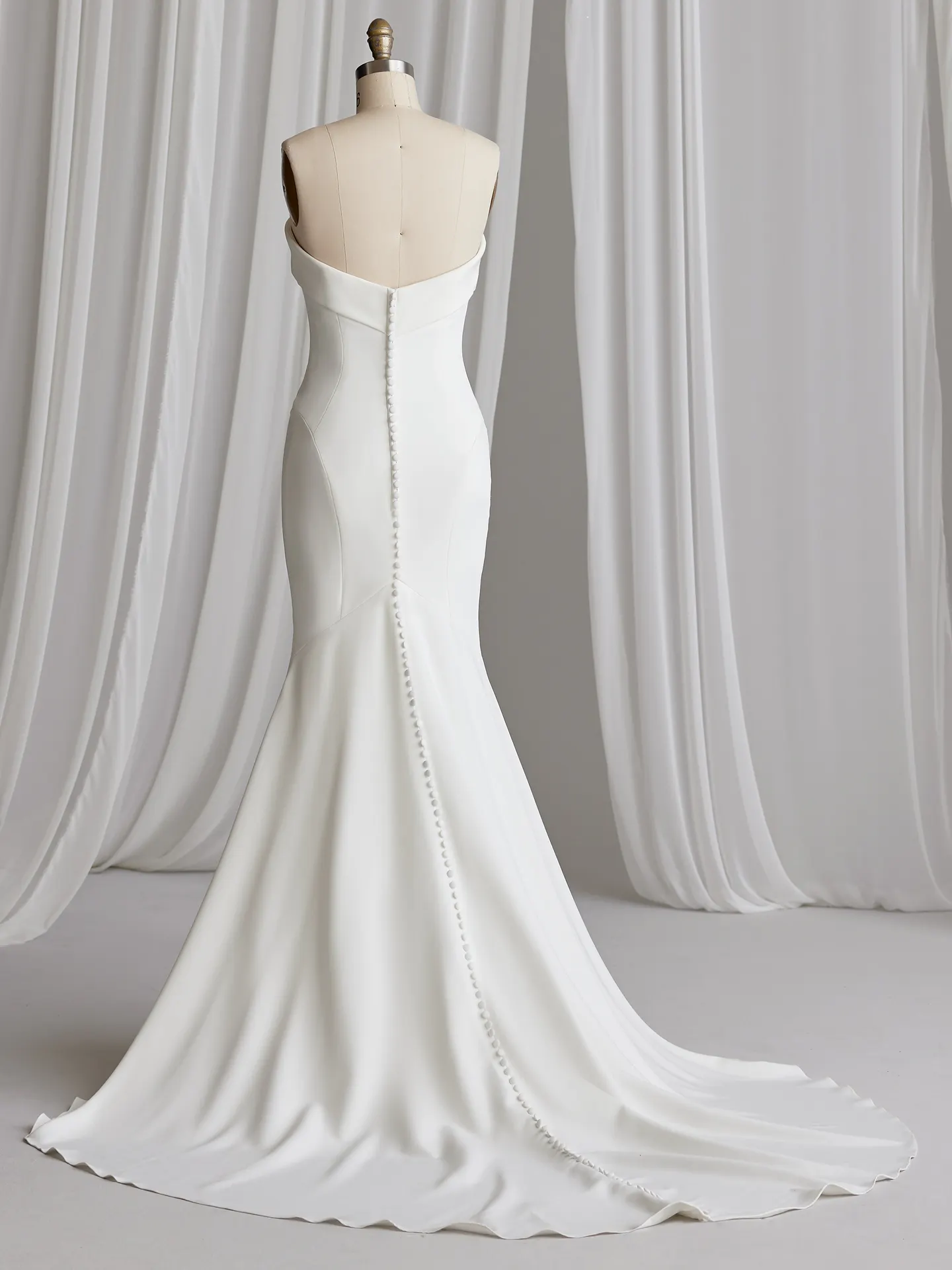 Rebecca Ingram Francine back view, straight neckline, crepe bridal dress with buttons