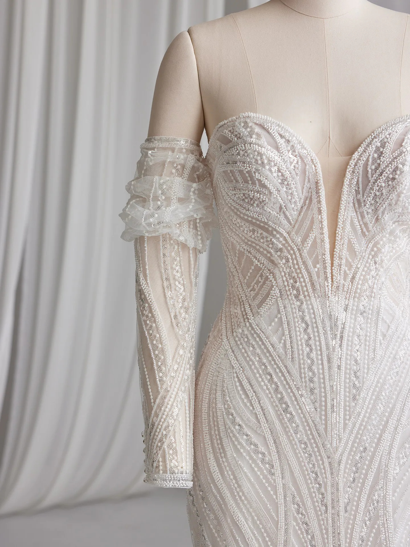 Sottero and Midgley Positano dress with detachable puff sleeves, front view.