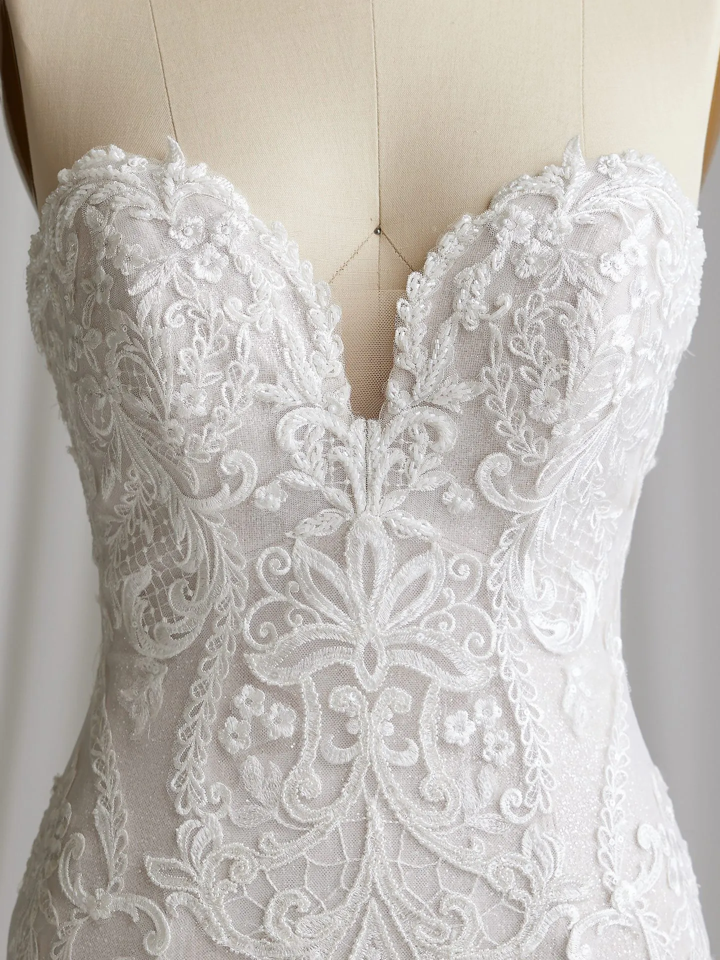 Maggie Sottero Frederique off-the-shoulder elegant lace detail close-up