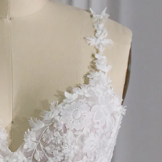 Maggie Sottero Ladonna floral detail bodice front view.
