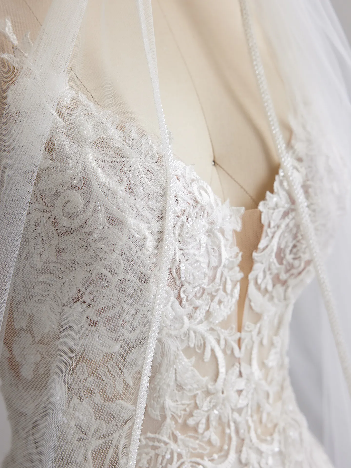 Rebecca Ingram Lizzy lace bodice detail with airy cathedral-length veil