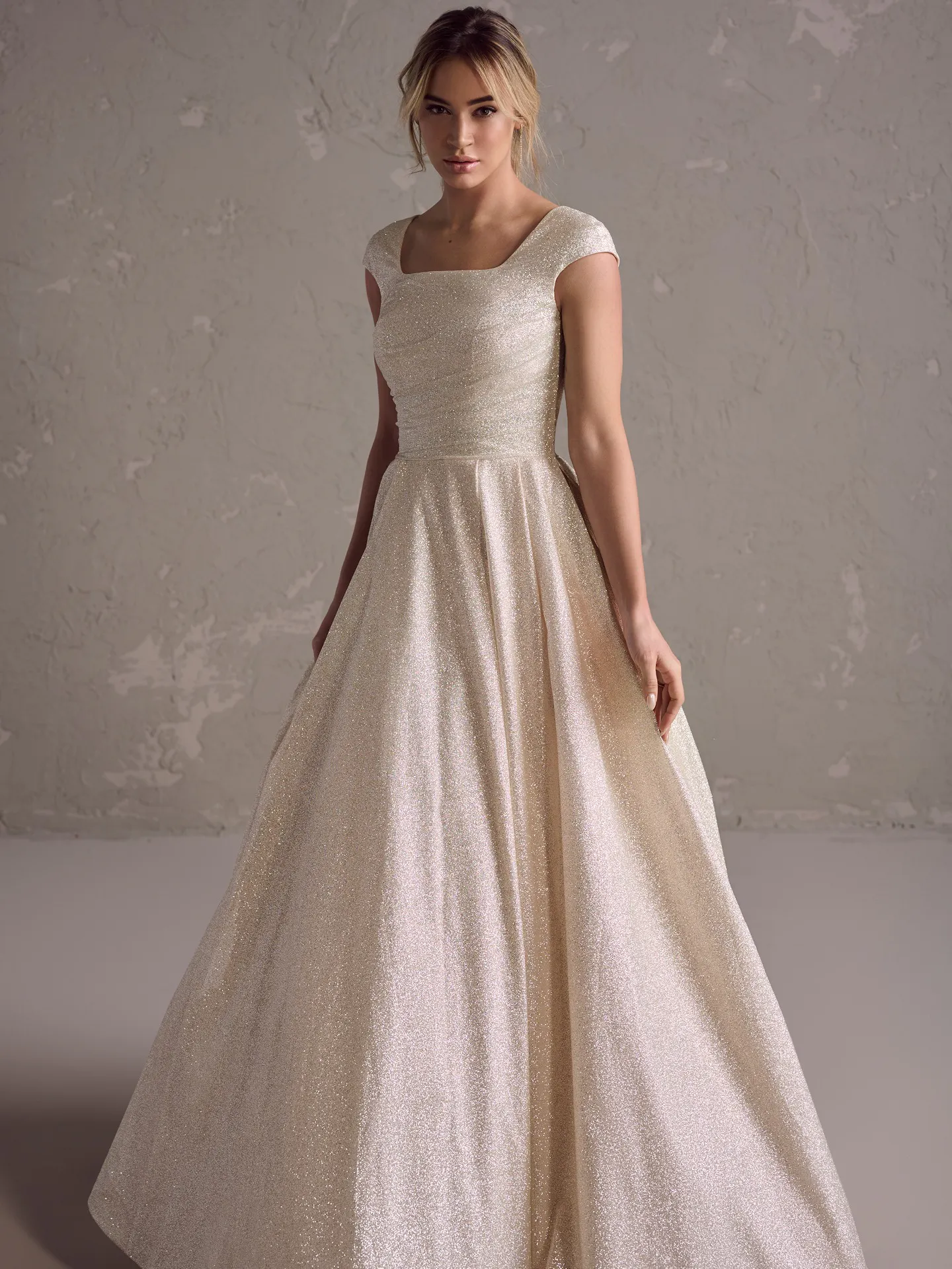 Anniston Leigh front view glitter tulle gown with cap sleeves