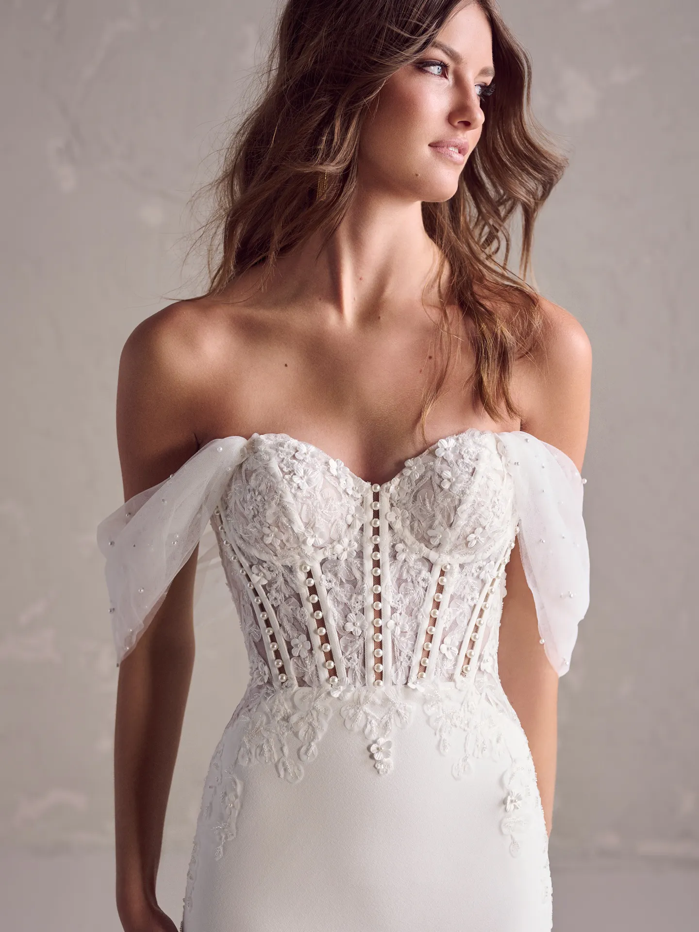 Maggie Sottero wedding dress with lace and sheer cap sleeves front view