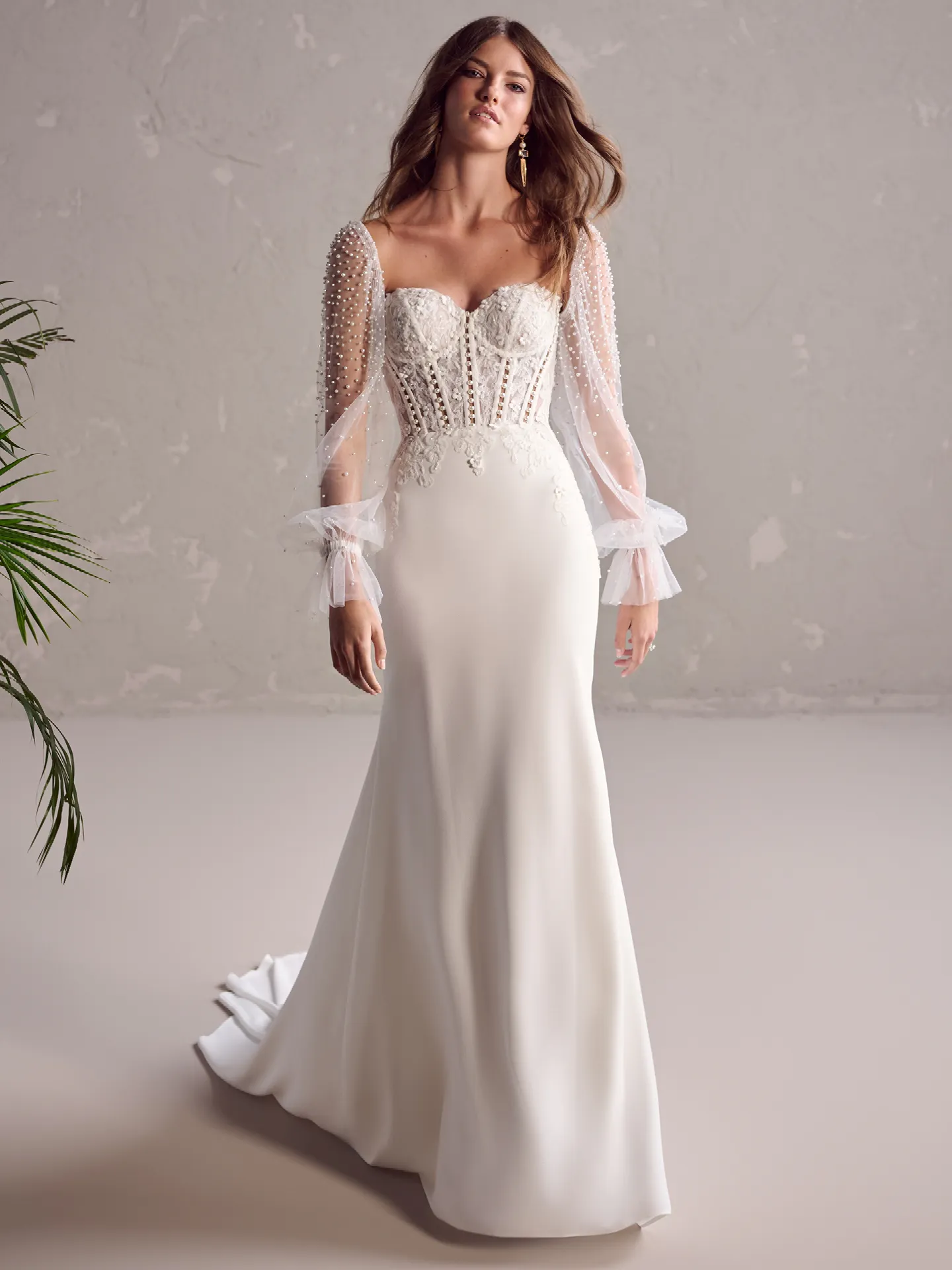 Maggie Sottero Doritte front view with pearl sleeves and crepe skirt.