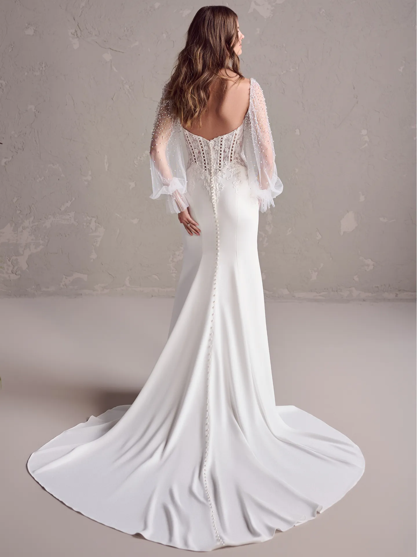 Maggie Sottero Doritte back view pearl sleeve crepe wedding dress