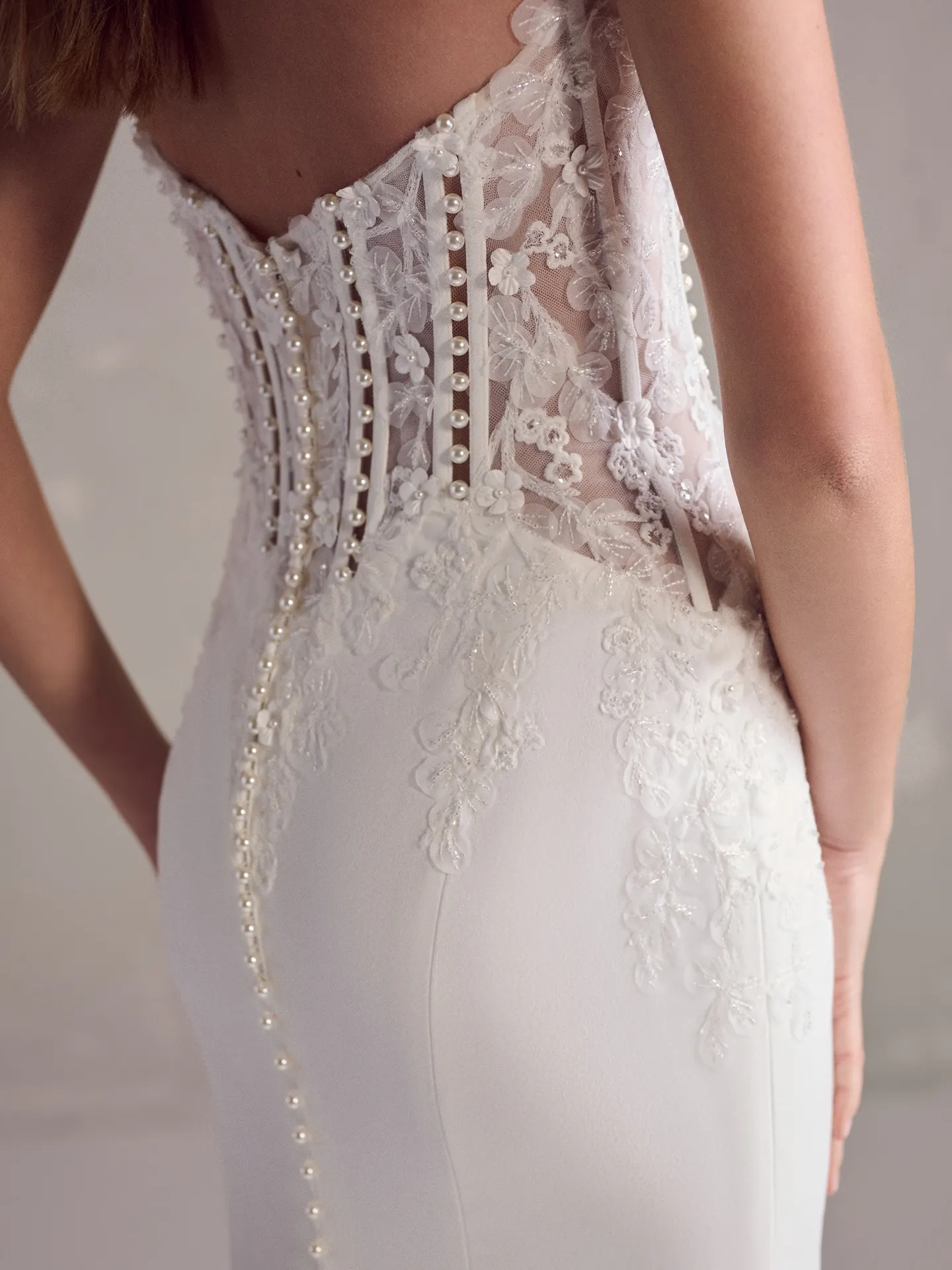 Maggie Sottero Doritte back view with lace and pearl details