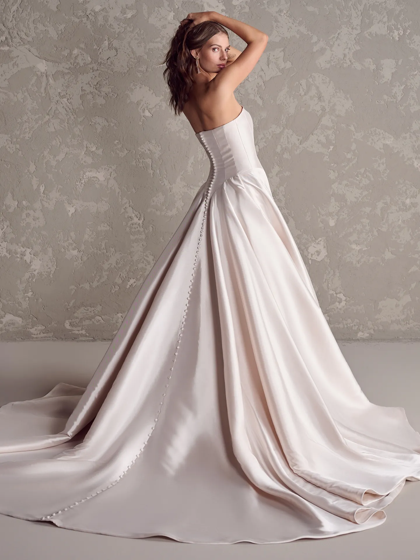 Maggie Sottero Emmanuelle back view, yarn-dyed strapless wedding dress with train.