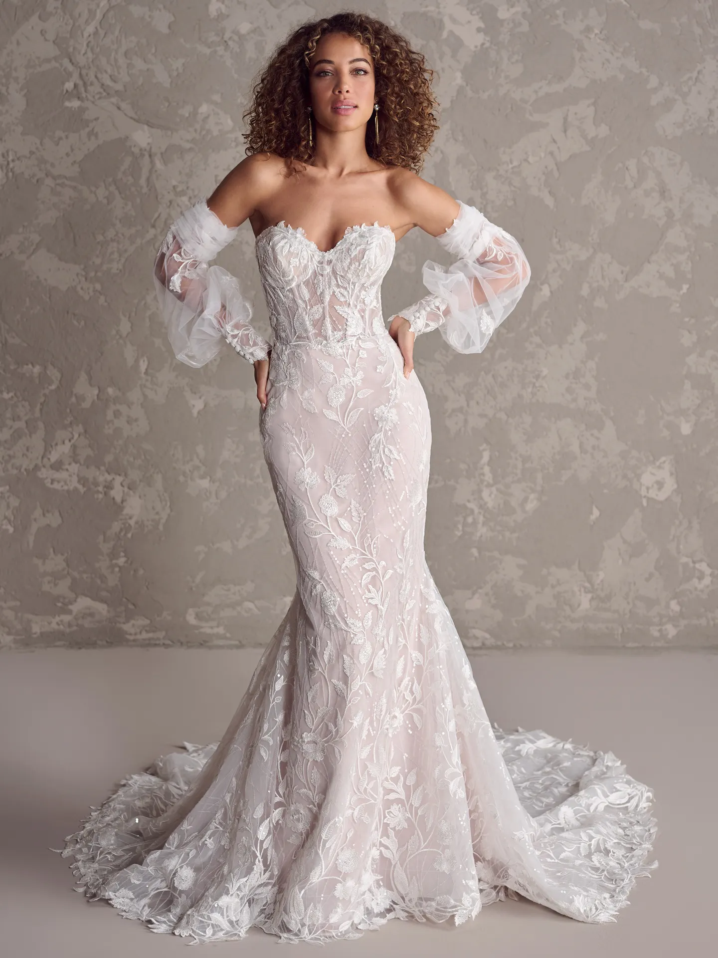 Maggie Sottero Fairchild front view, sequin lace gown, romantic design with sheer sleeves.