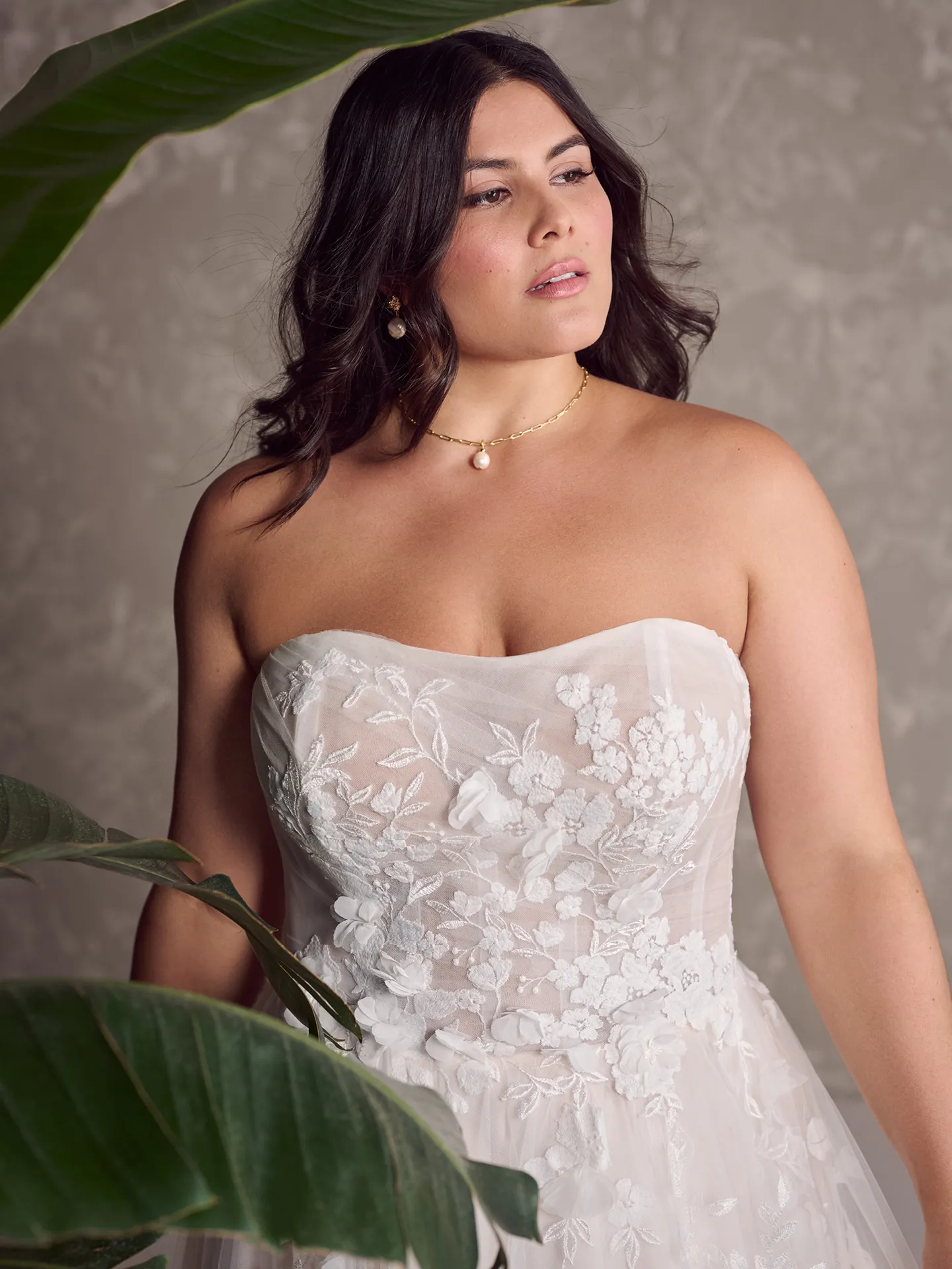 Maggie Sottero Laila gown front view 3D floral detail, neutral background.