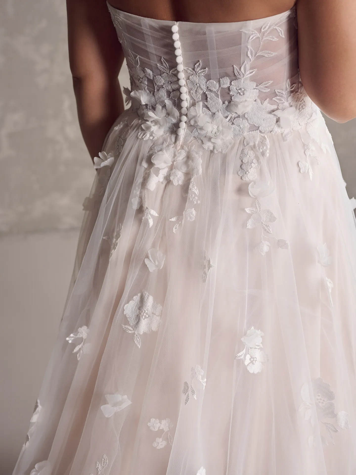 Laila gown back view with 3D floral detail by Maggie Sottero