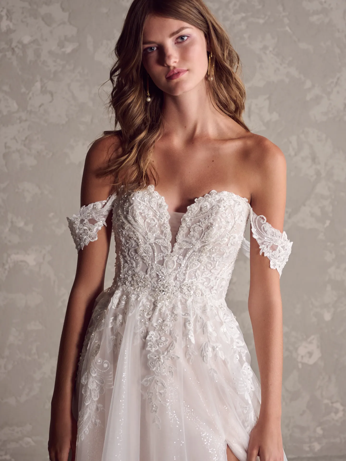 Maggie Sottero wedding dress front view with lace cap sleeves