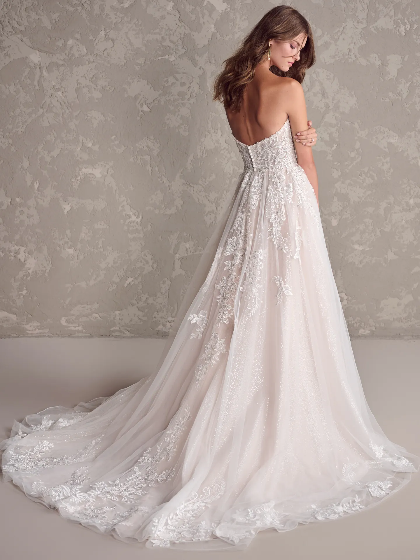 Marguerite back view, lace A-line gown with floral lace, Maggie Sottero.
