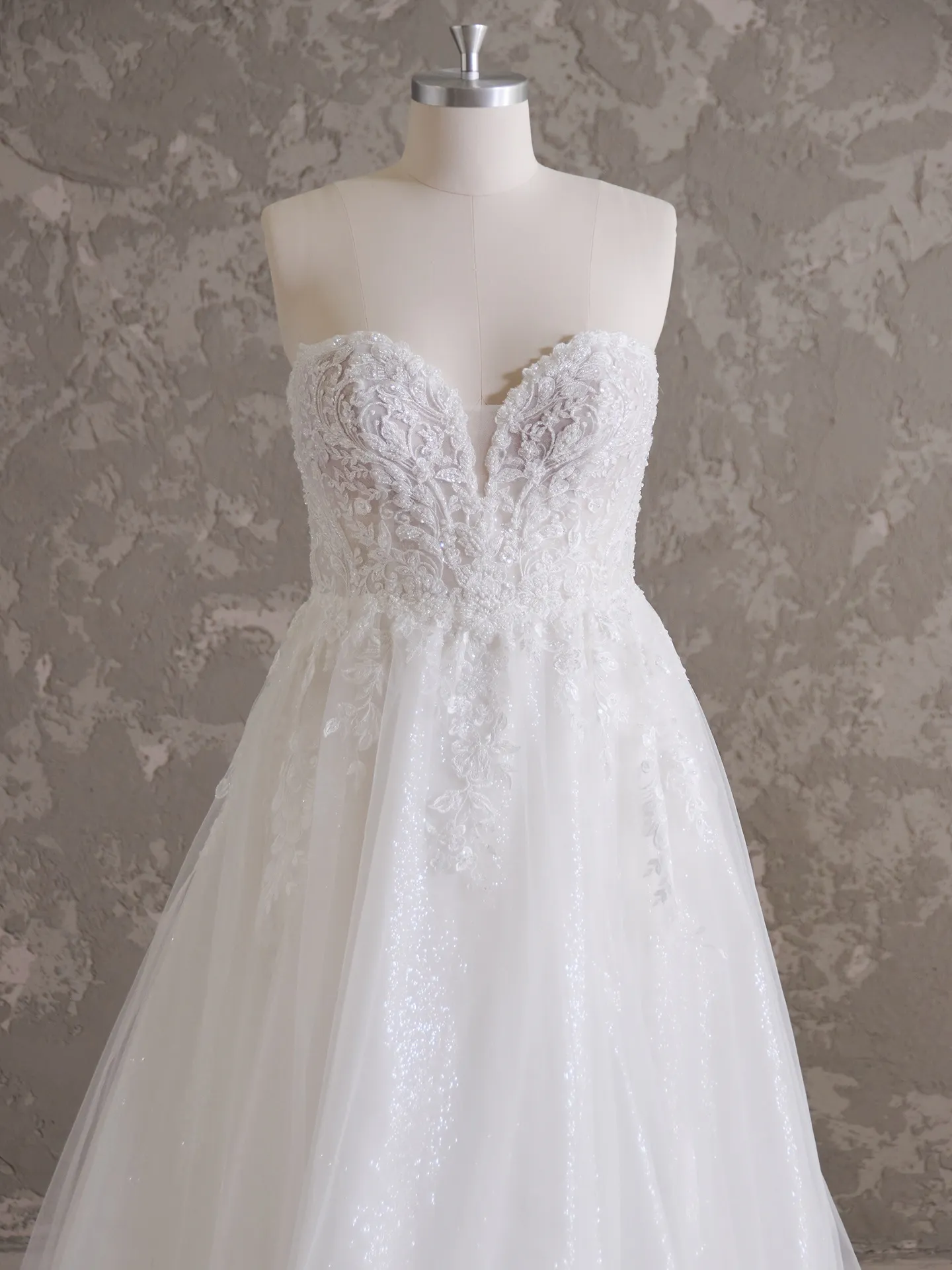 Maggie Sottero Marguerite A-Line bridal gown front view with lace detail.