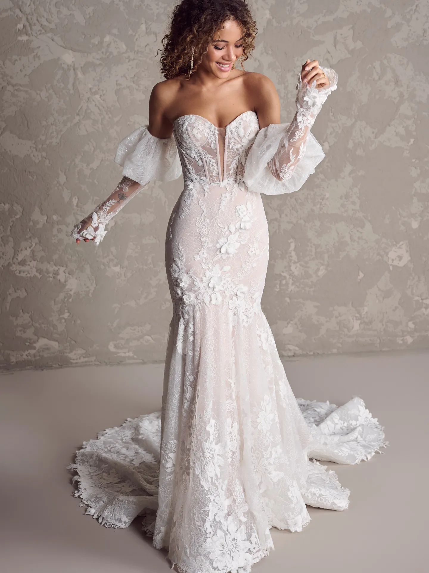 Maggie Sottero Ortensia front view lace bridal dress with puff sleeves.