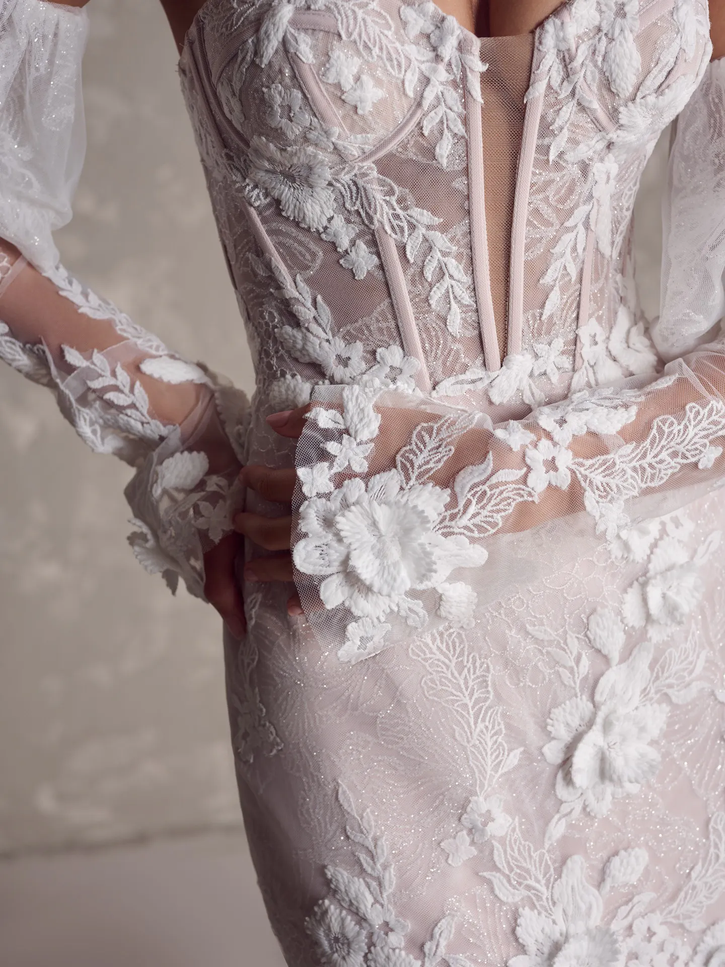 Maggie Sottero Ortensia lace bridal dress with intricate floral patterns front view