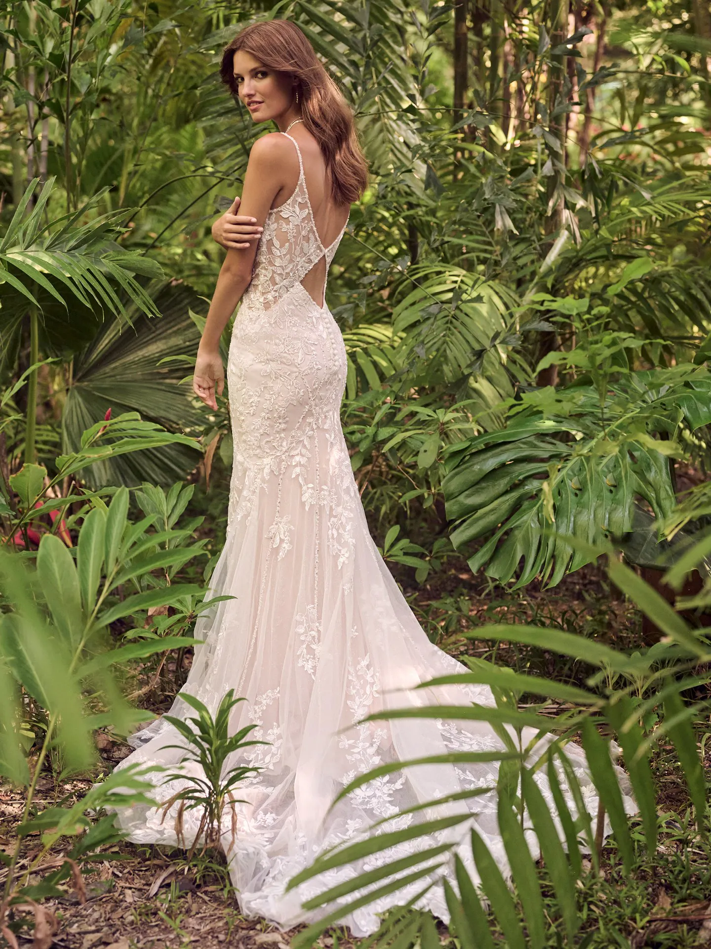 sydney lace wedding dress back view in lush jungle setting