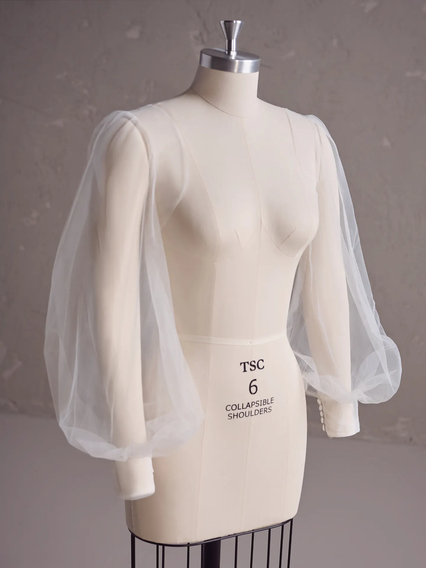 Alexandria bishop sleeves on mannequin, Maggie Sottero, simple design, front view.