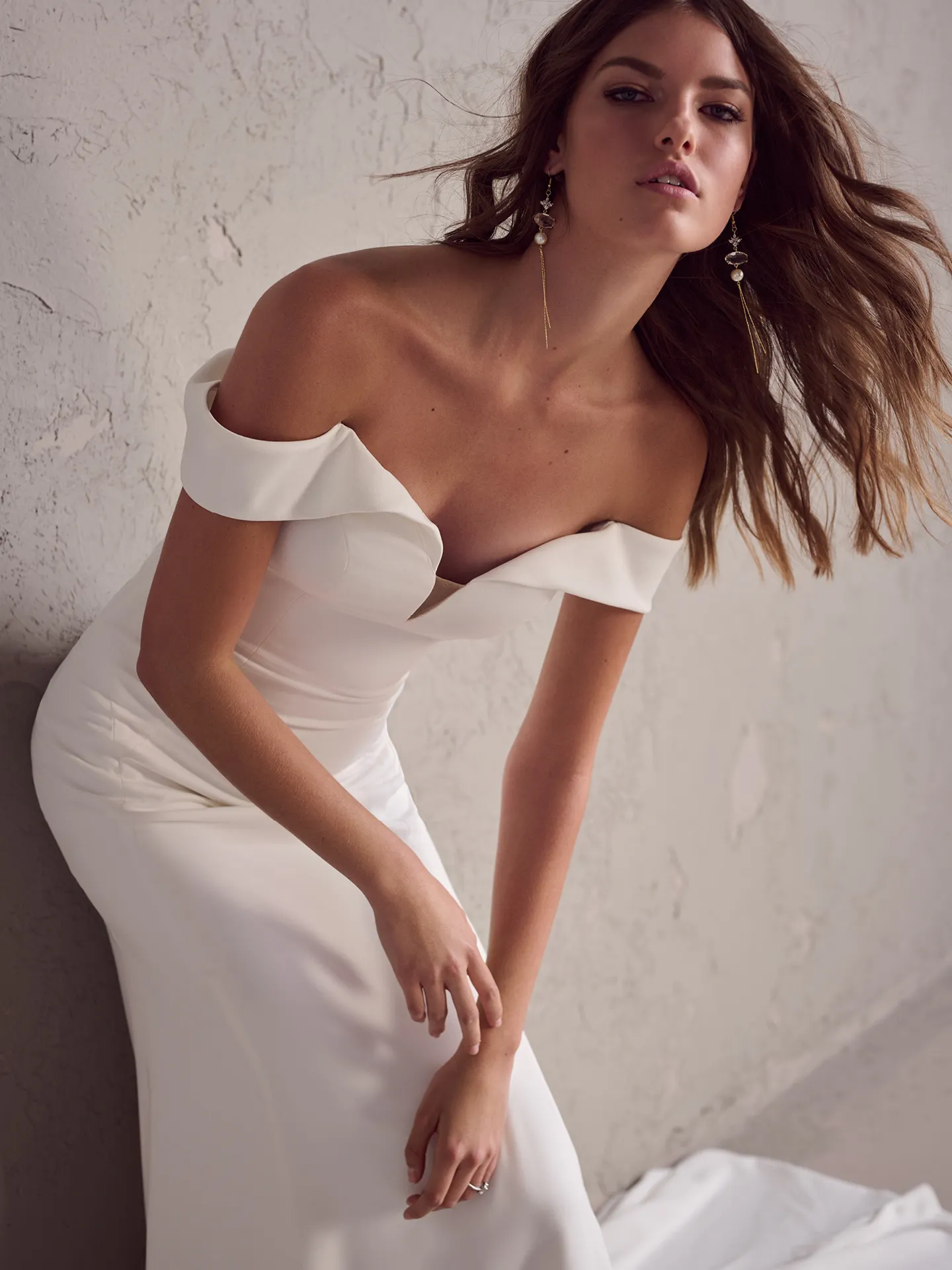 Rebecca Ingram Colby front view, satin fit-and-flare bridal dress with off-shoulder design.