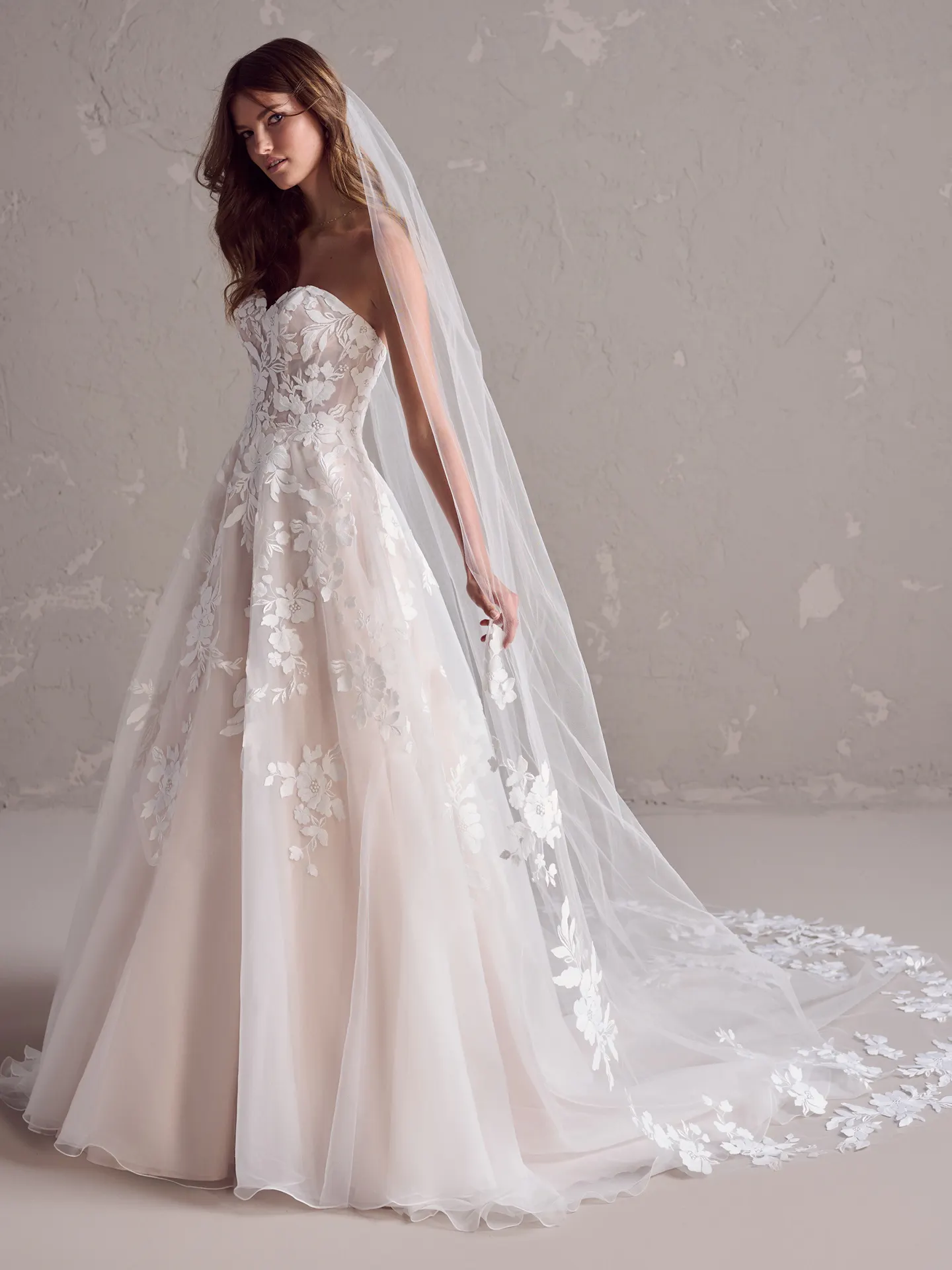 Rebecca Ingram Ruby front view, sweetheart neck A-line bridal gown with floral lace.