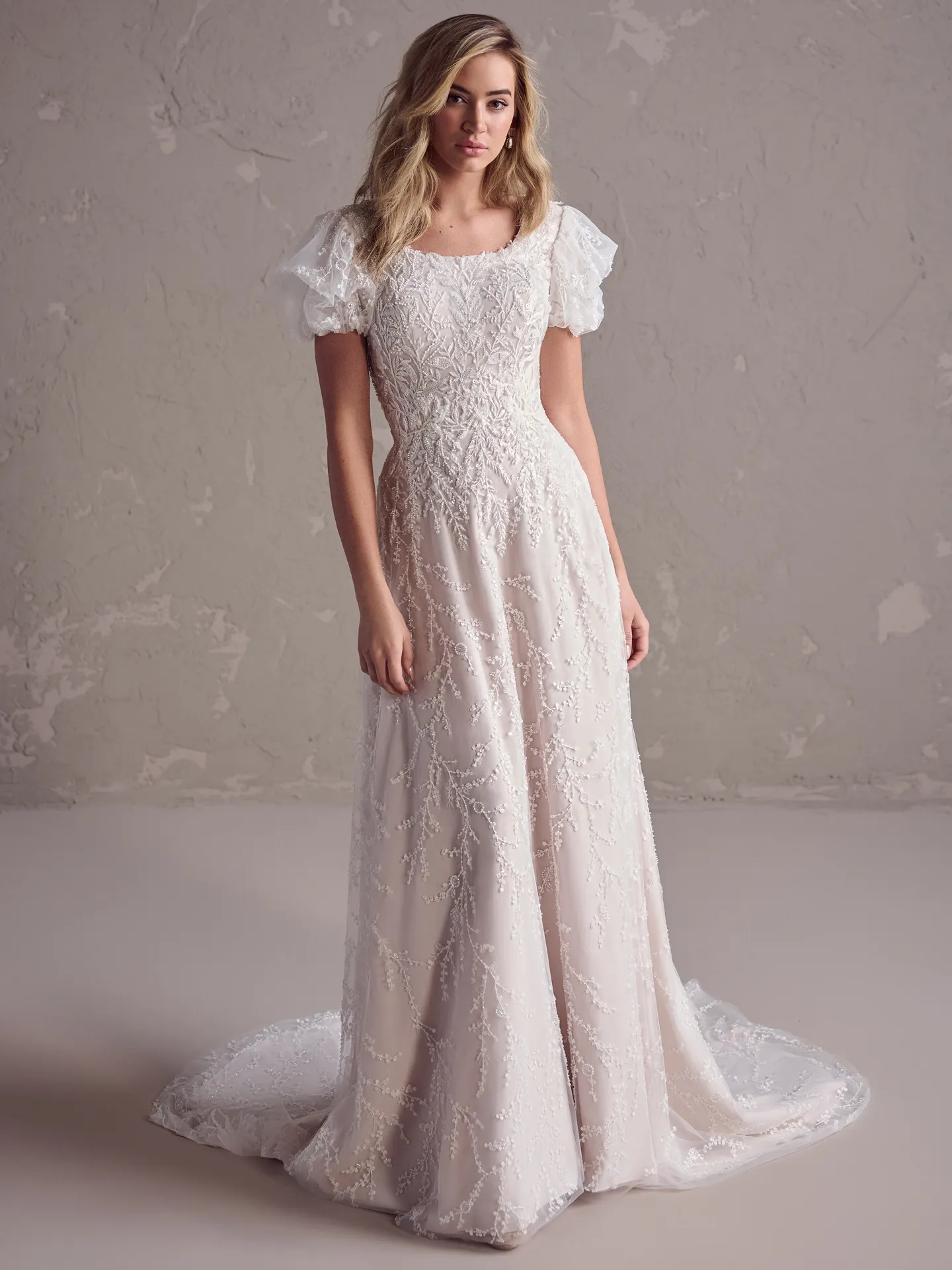 Rebecca Ingram Sonya front view scoop neckline wedding dress with lace detailing