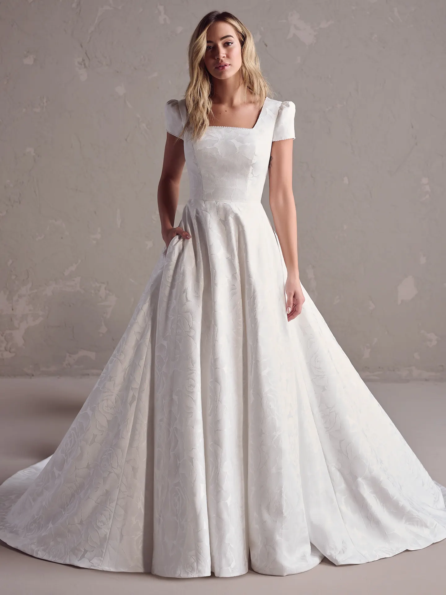 Rebecca Ingram Vesta Leigh front view, short sleeves, A-line bridal gown